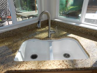 New granite countertops and undermount sink.